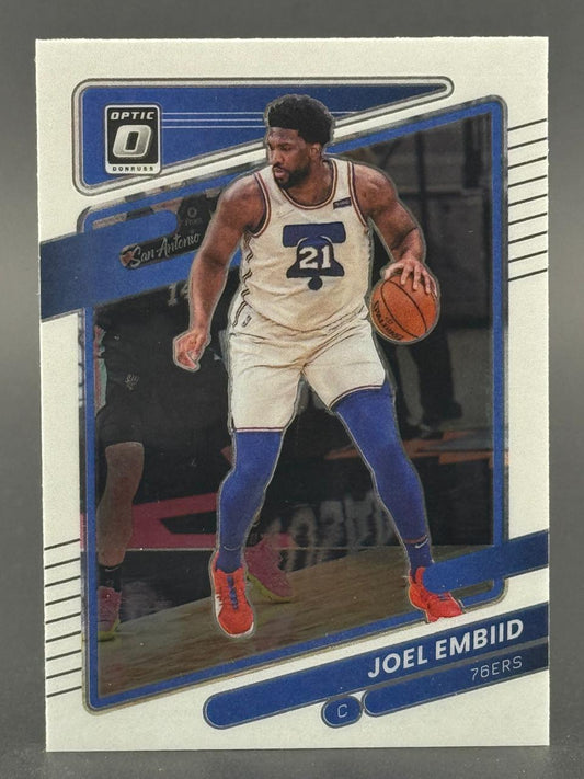 Joel Embiid 76ers basketball card, Donruss Optic set, dribbling on court.