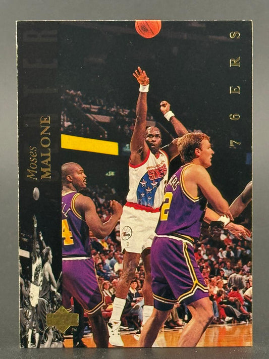 Moses Malone 76ers basketball trading card.