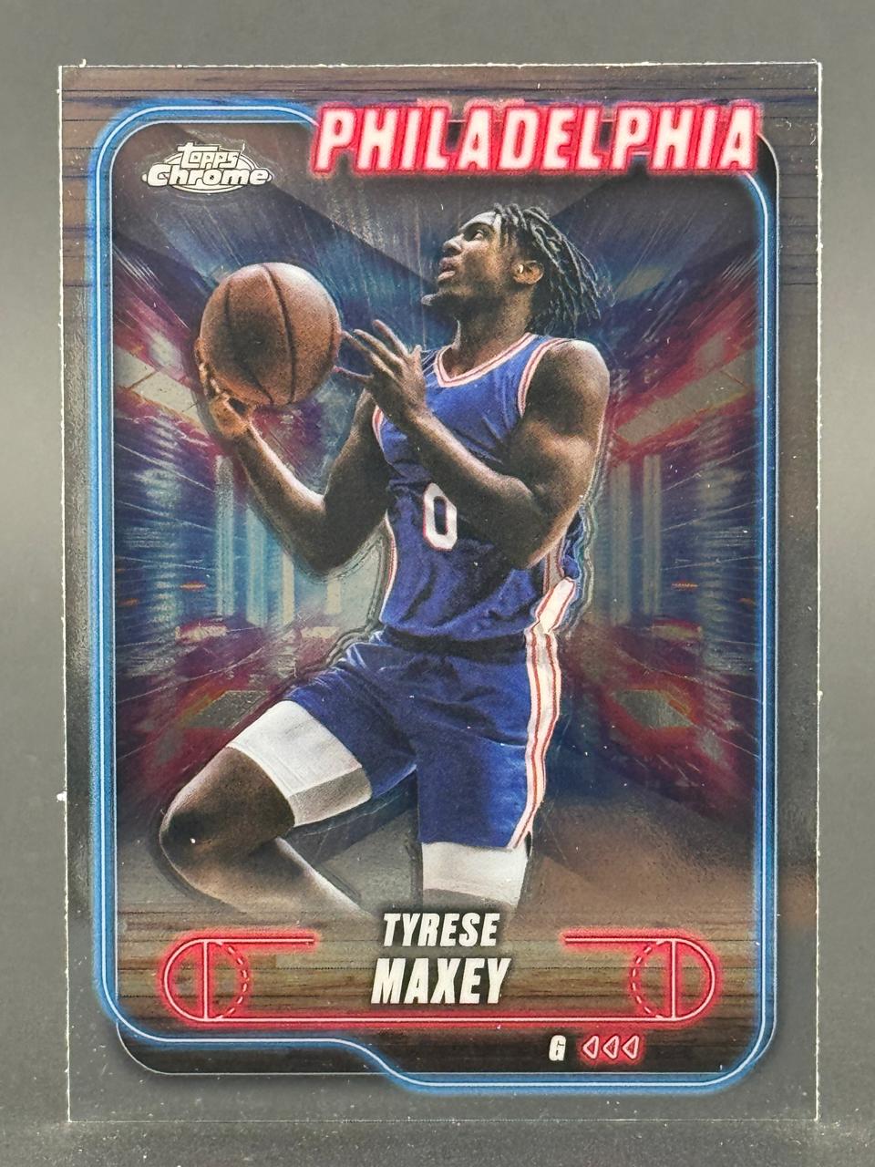 Tyrese Maxey Topps Chrome Philadelphia basketball trading card.
