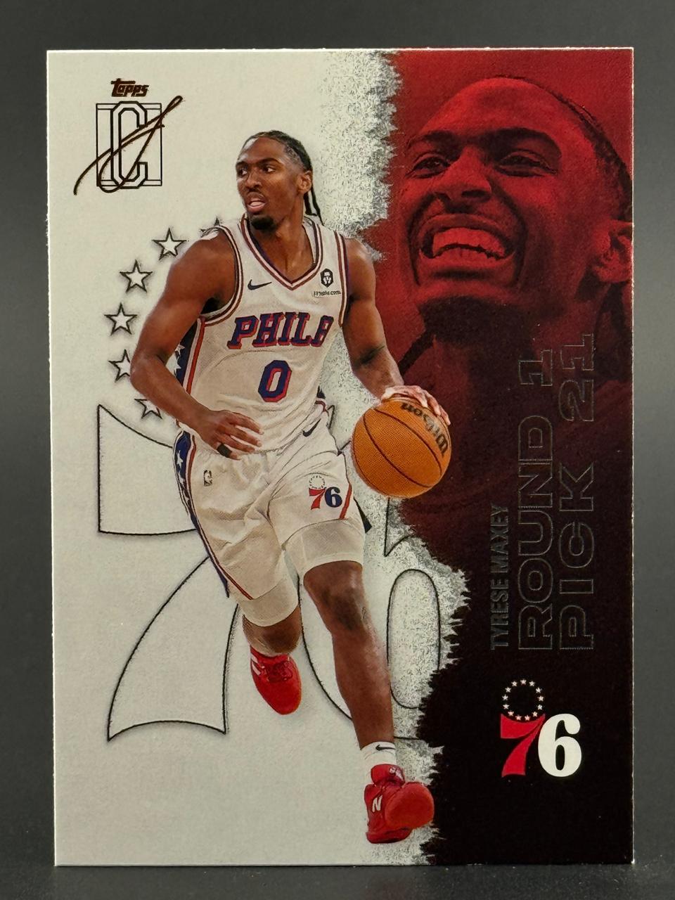 Tyrese Maxey 76ers basketball card dribbling, text reads "Round 1 Pick 21," Topps branding.