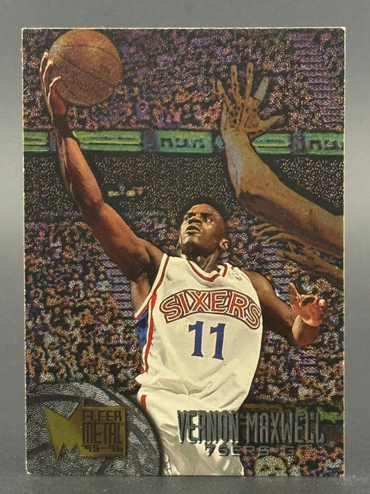 1995-96 Fleer Metal Vernon Maxwell trading card featuring the 76ers guard going up for a layup.