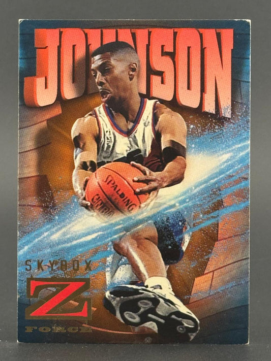 1996 SkyBox Z-Force basketball card featuring Johnson holding a basketball.
