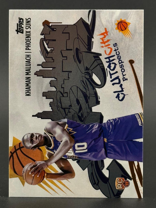 Topps Khaman Maluach Phoenix Suns Clutch City Prospects rookie card featuring a vertical urban graphic.