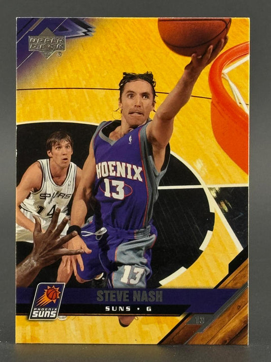 Steve Nash Upper Deck basketball card featuring him in a Phoenix Suns uniform driving for a layup.