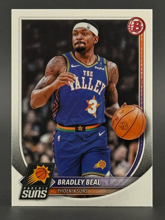 Bradley Beal trading card showing him in a blue Phoenix Suns jersey dribbling a basketball.