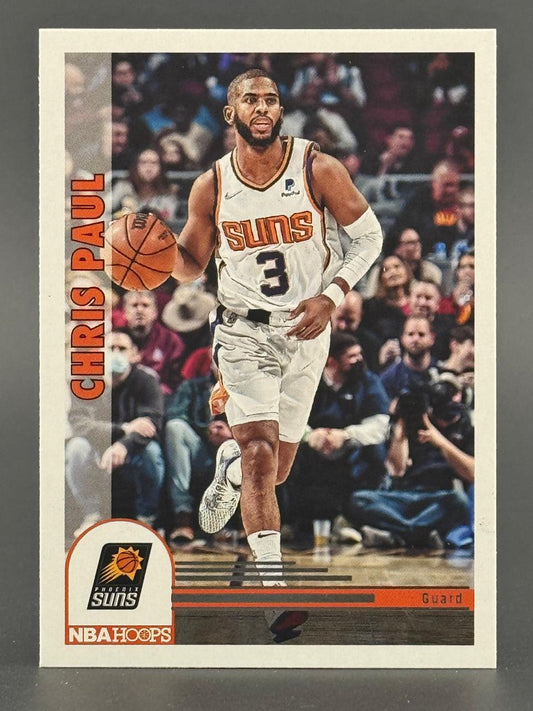 Chris Paul Phoenix Suns trading card, NBA Hoops set, showing him dribbling the basketball in uniform.