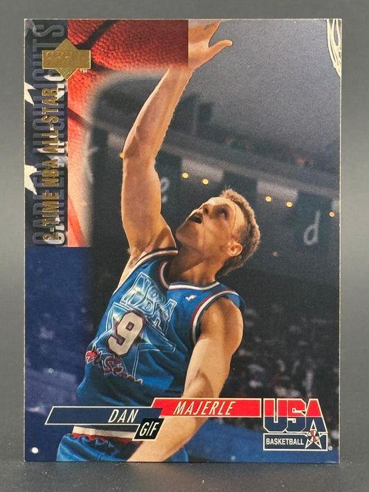 Dan Majerle basketball card showing him in a blue USA jersey shooting.