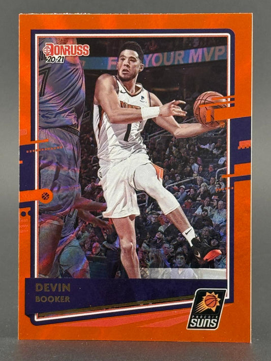 2020-21 Donruss Devin Booker Phoenix Suns basketball card with orange border.