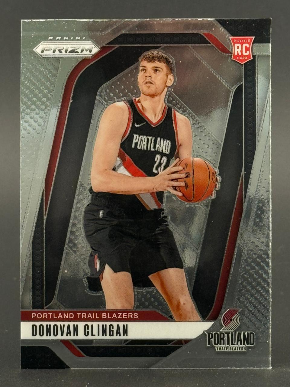 2024-25 Panini Prizm Donovan Clingan rookie card, Portland Trail Blazers #23, holding a basketball.