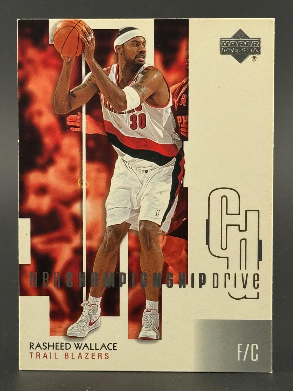 Rasheed Wallace Trail Blazers basketball card, Upper Deck NBA Championship Drive set, holding a basketball.