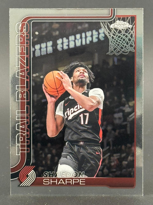 Shaedon Sharpe Topps Chrome basketball card holding a ball.
