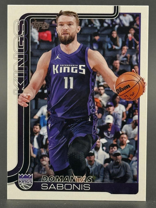 Domantas Sabonis 2023-24 Topps Basketball card #11 in a Sacramento Kings uniform dribbling a basketball.