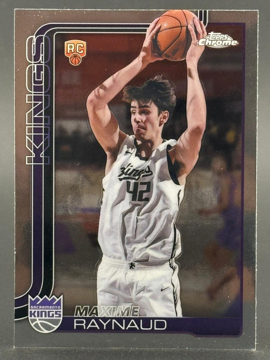 Maxime Raynaud Topps Chrome Kings rookie basketball card holding ball.