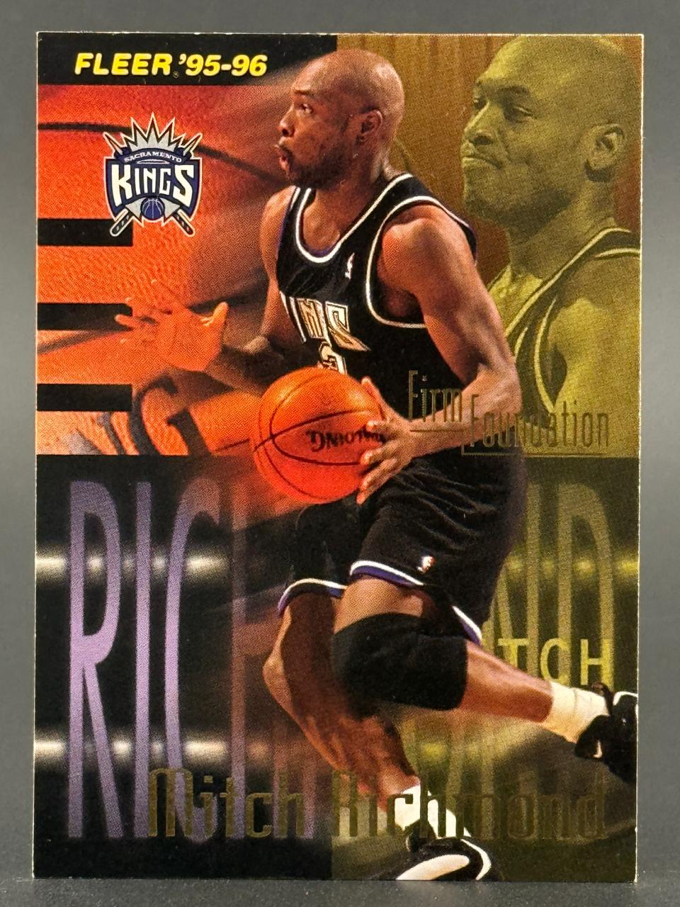 1995-96 Fleer Mitch Richmond basketball card with Sacramento Kings logo.