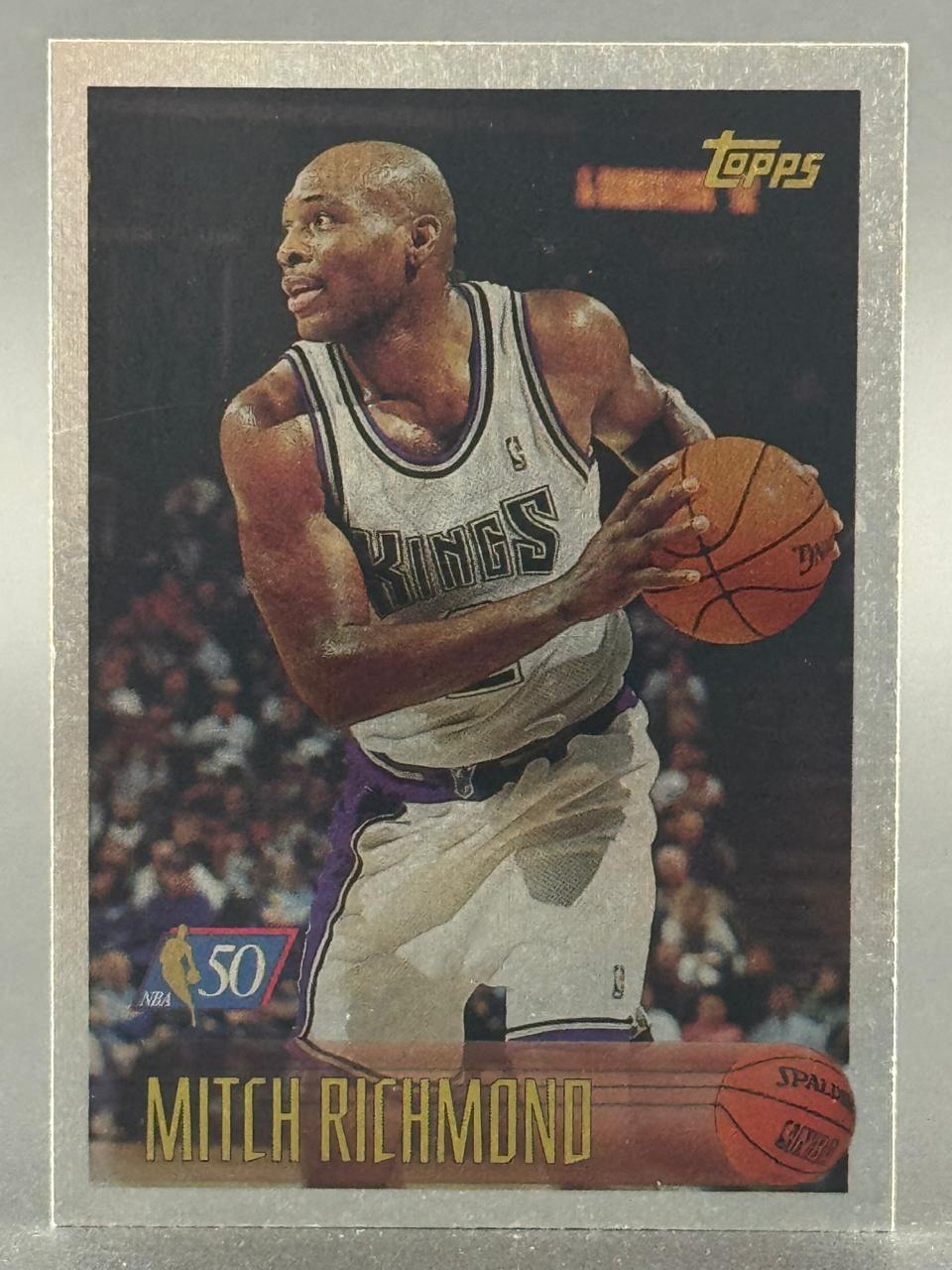 Mitch Richmond 1996-97 Topps basketball card, showing him in a Kings uniform with a basketball.