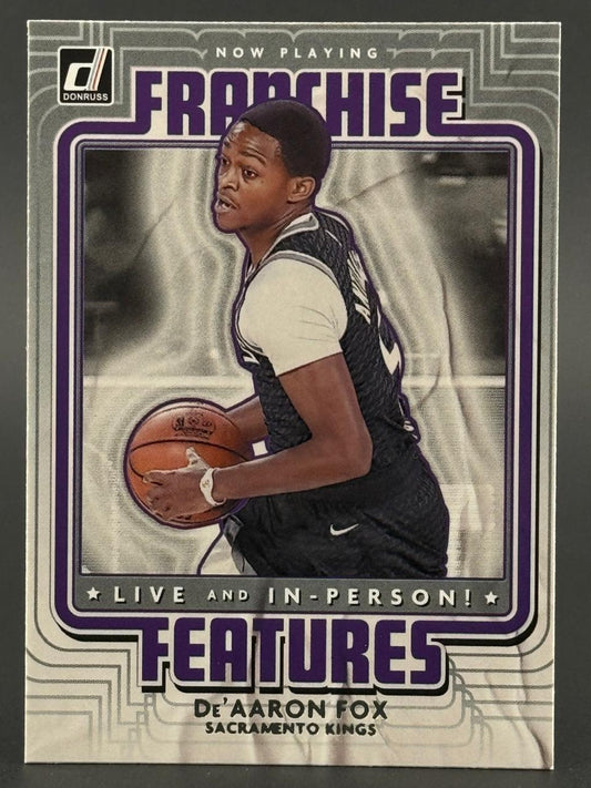 De'Aaron Fox 2021-22 Donruss Franchise Features basketball card holding a basketball.