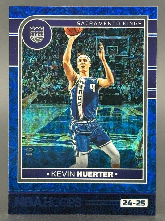 24-25 NBA Hoops Kevin Huerter basketball card showing him shooting in a blue uniform.