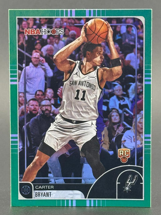 Trading card of Bryant Carter, San Antonio, NBA Hoops, holding a basketball with a rookie card logo.