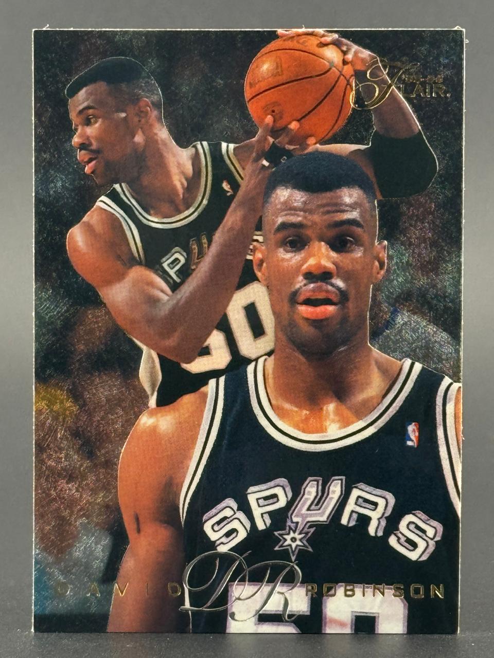 David Robinson 1993-94 Fleer Flair basketball card with two images of the player in Spurs uniform.