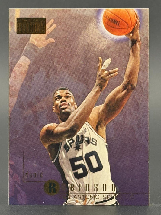David Robinson San Antonio Spurs trading card, showing him in a white jersey shooting a basketball.