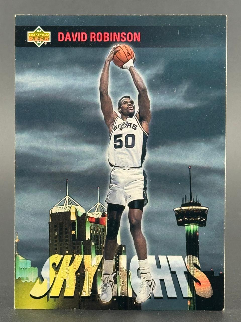 1993-94 Upper Deck David Robinson basketball card, #50, showing him holding a basketball above his head.