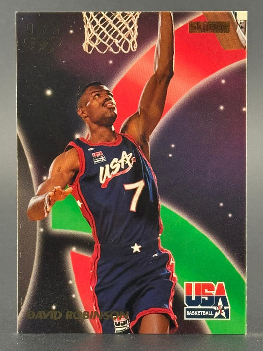 1992 SkyBox USA Basketball trading card featuring David Robinson (#7) dunking in a USA jersey.