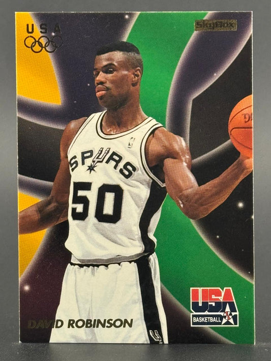David Robinson 1992 SkyBox USA Basketball trading card featuring him in a Spurs jersey holding a basketball.