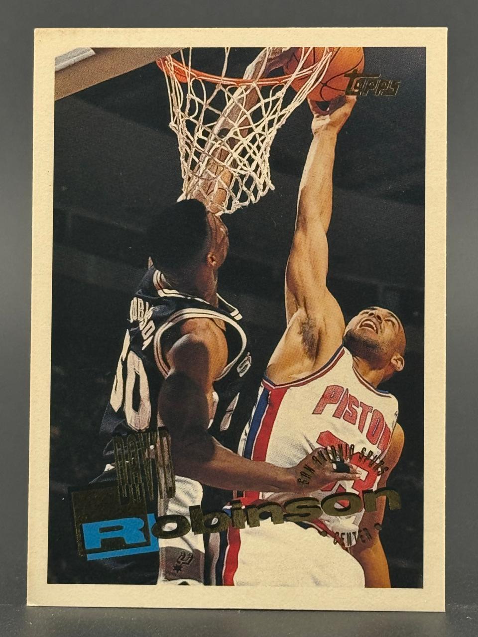 David Robinson 1993 Topps basketball card, showing him dunking.