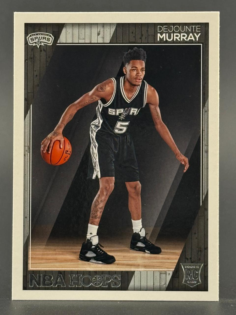 2016-17 NBA Hoops Dejounte Murray rookie basketball card.