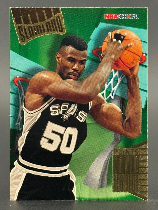 David Robinson 1993-94 NBA Hoops Slamland basketball card holding a basketball.