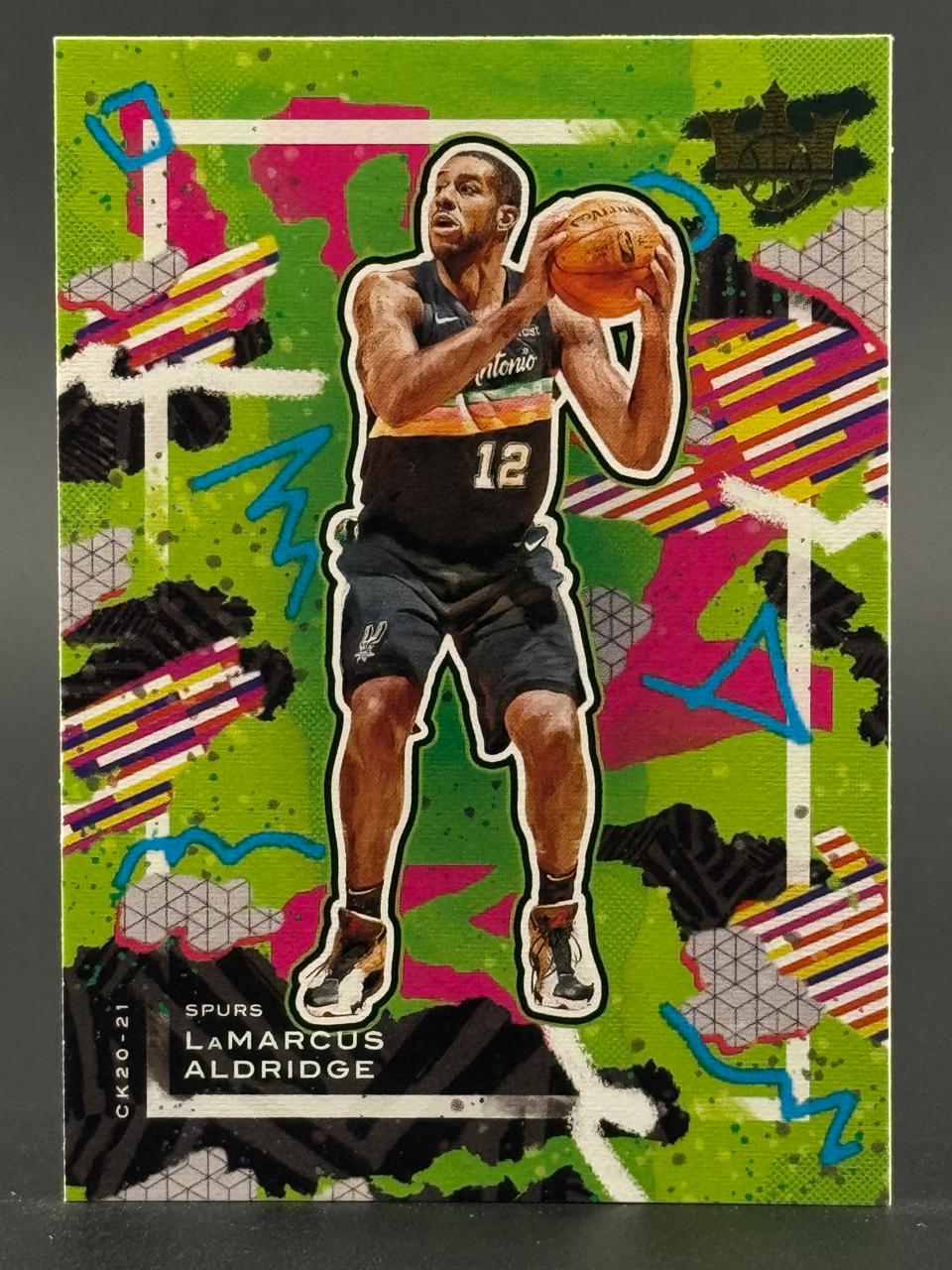 2020-21 Panini Court Kings LaMarcus Aldridge trading card featuring abstract green and pink background.
