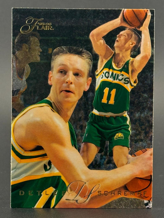 1995-96 Flair Detlef Schrempf basketball trading card featuring multiple images of the player in his Sonics uniform.