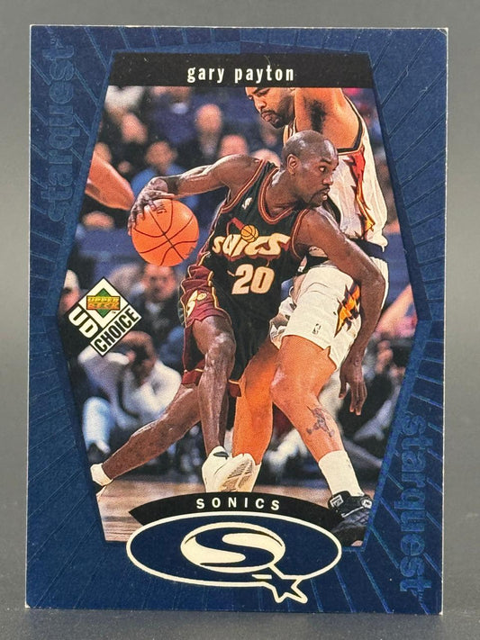 1998-99 UD Choice StarQuest Gary Payton trading card #SQ20, showing Payton dribbling in a Sonics uniform.