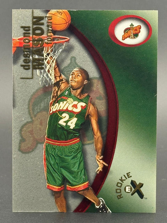 2000-01 E-X Desmond Mason Rookie trading card, #24, showing him dunking in a Sonics uniform.