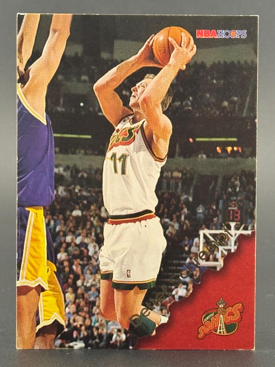 1993-94 NBA Hoops Detlef Schrempf trading card #342 featuring the Seattle Sonics player shooting.