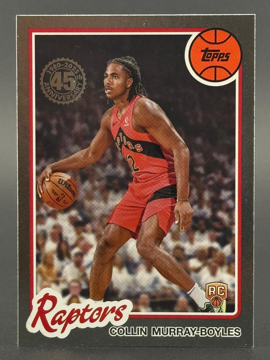 2024 Topps Collin Murray-Boyles rookie basketball card, featuring the Raptors player dribbling.