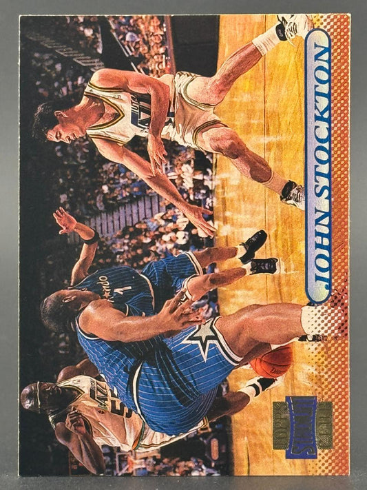 1996-97 Topps Finest John Stockton basketball card #140, featuring action photography.
