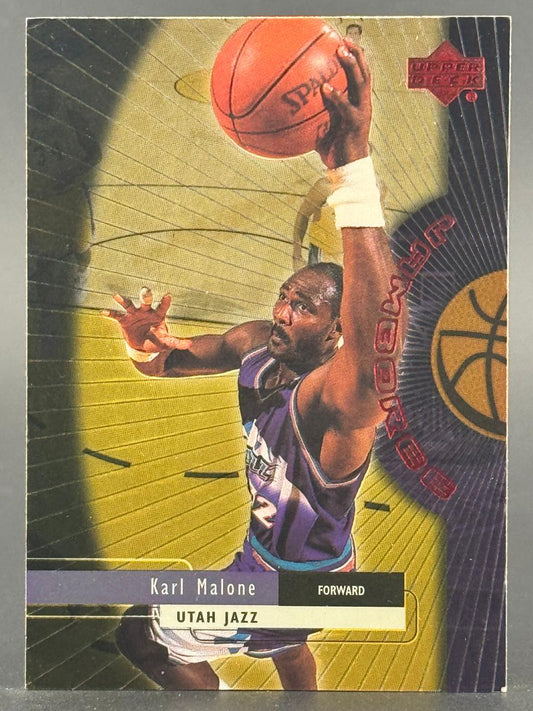 Karl Malone 1990s Upper Deck Jam Session basketball card, forward for the Utah Jazz, dunking a basketball.