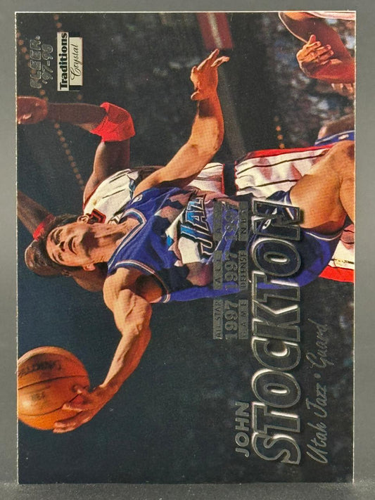 1997-98 Fleer Traditions Crystal John Stockton trading card featuring him dribbling a basketball.