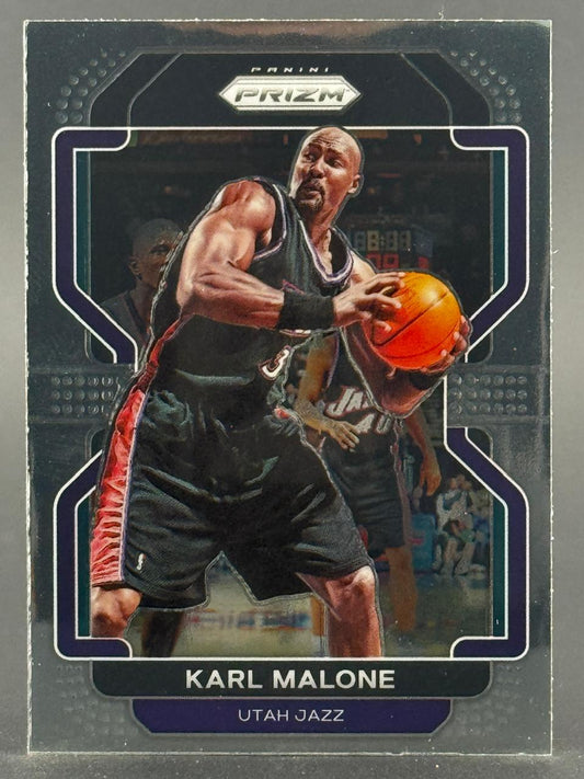 Karl Malone 2012-13 Panini Prizm basketball card holding a basketball.