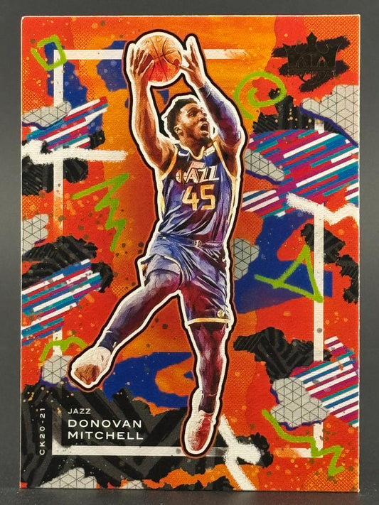 2020-21 Court Kings Donovan Mitchell trading card featuring him in a Utah Jazz uniform holding a basketball.