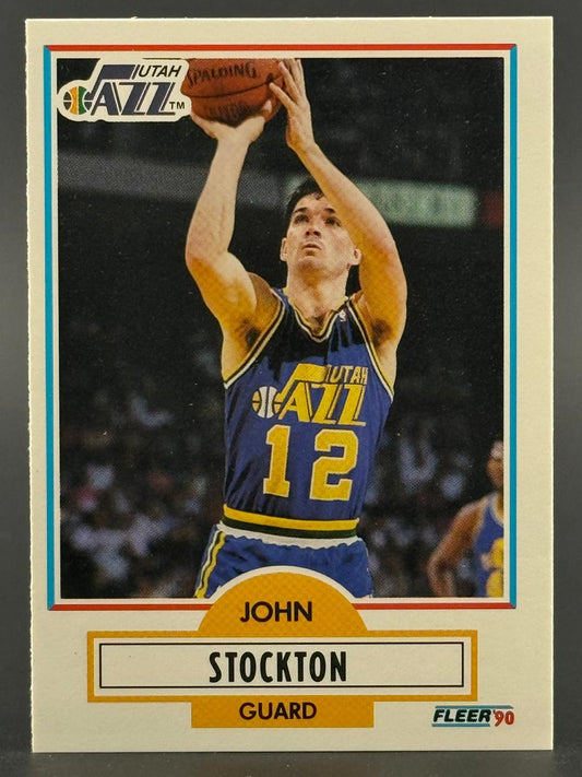 1990 Fleer John Stockton basketball card #12, showing Stockton shooting a jump shot in a Utah Jazz uniform.