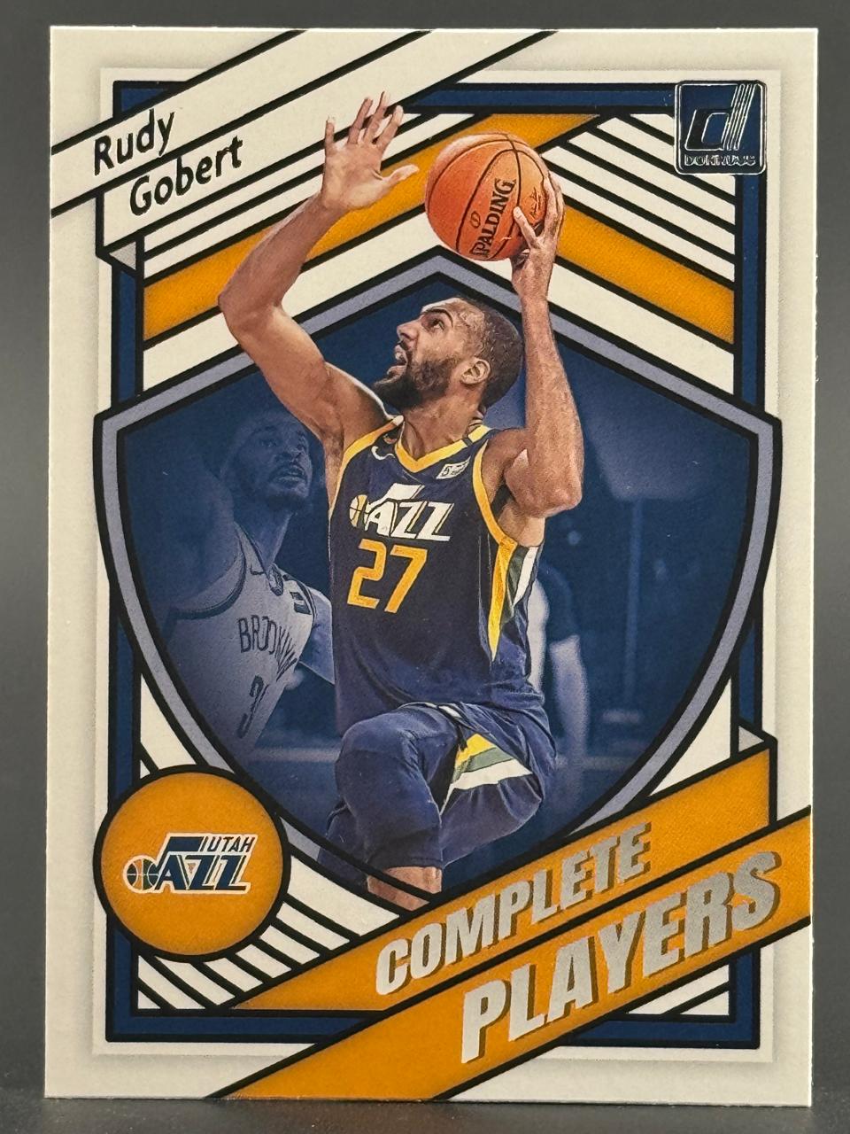 Trading card of Rudy Gobert in a Utah Jazz uniform, part of the Donruss Complete Players insert set.
