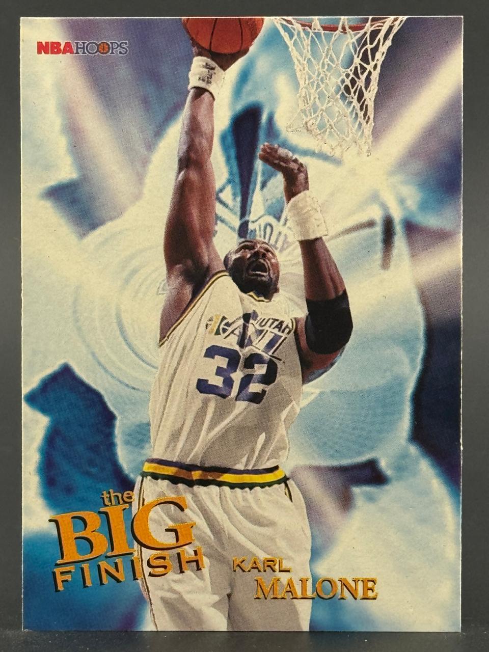 Karl Malone 1990s NBA Hoops "The Big Finish" basketball card dunking.