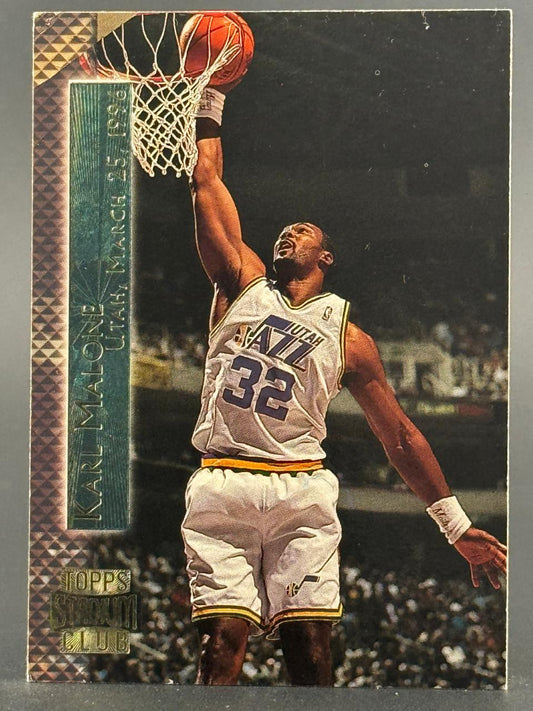 Karl Malone 1996 Topps Stadium Club basketball card showing him dunking.