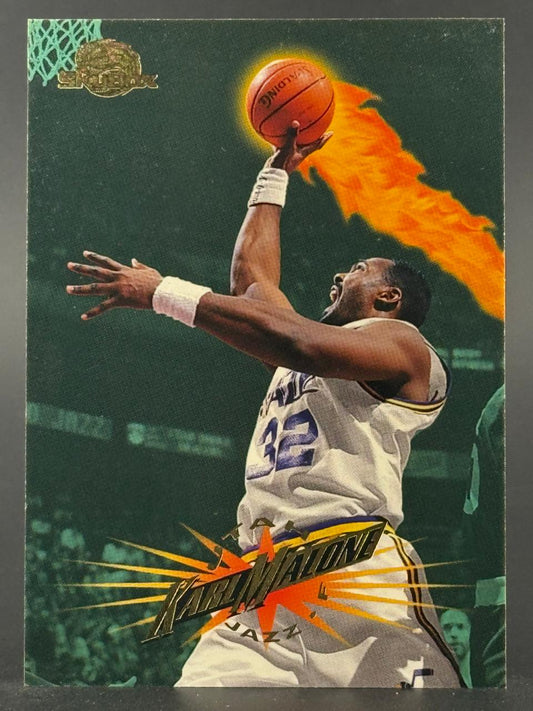 Karl Malone 32 Utah Jazz basketball trading card with a flaming basketball graphic.