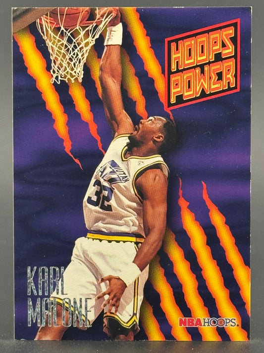 Karl Malone dunking on a 1990s NBA Hoops Power insert card.