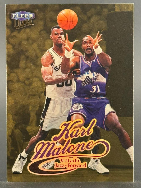 Karl Malone 1990-91 Fleer Ultra trading card #294, featuring Malone in Utah Jazz uniform guarding an opponent.