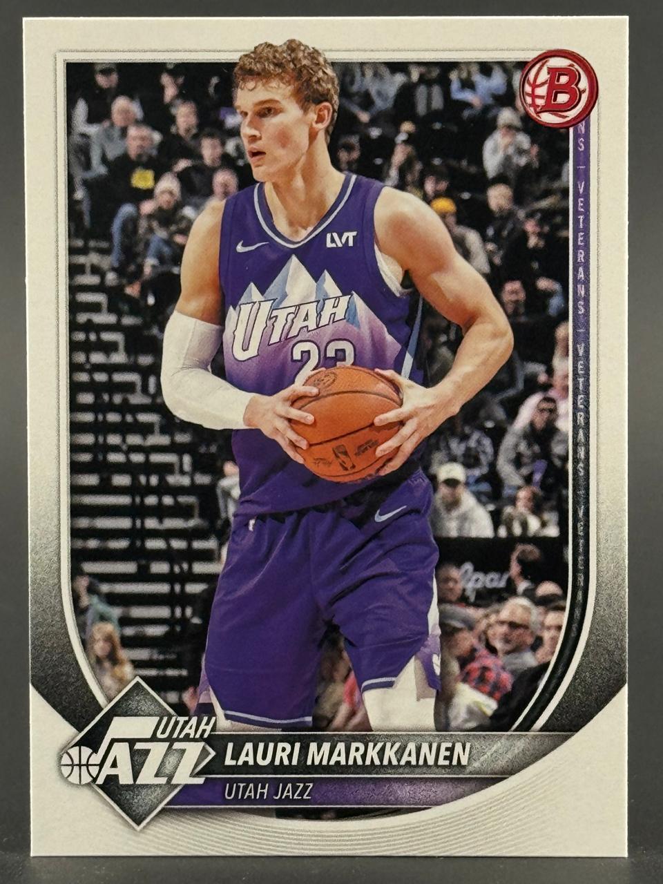 Lauri Markkanen trading card, Utah Jazz, holding a basketball.