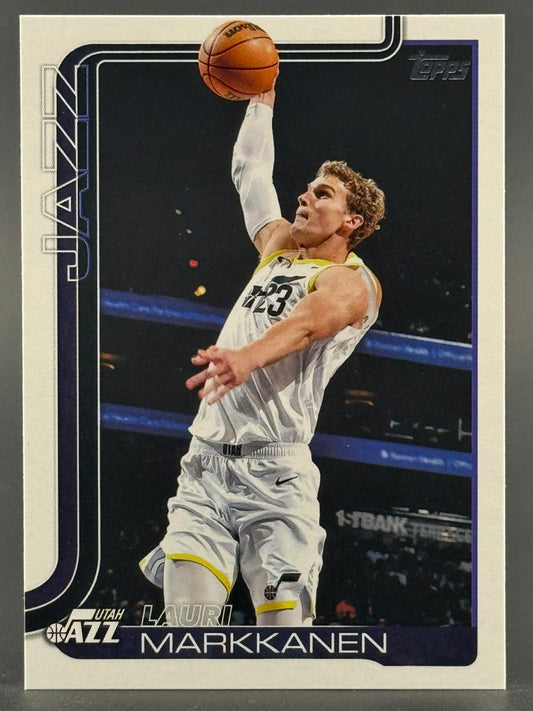 Lauri Markkanen Utah Jazz Topps basketball card, reaching up to hold a basketball.